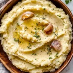 Roasted Garlic Mashed Potatoes {Slow Cooker}