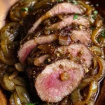 Maple Mustard beef Tenderloin with Caramelized Onions